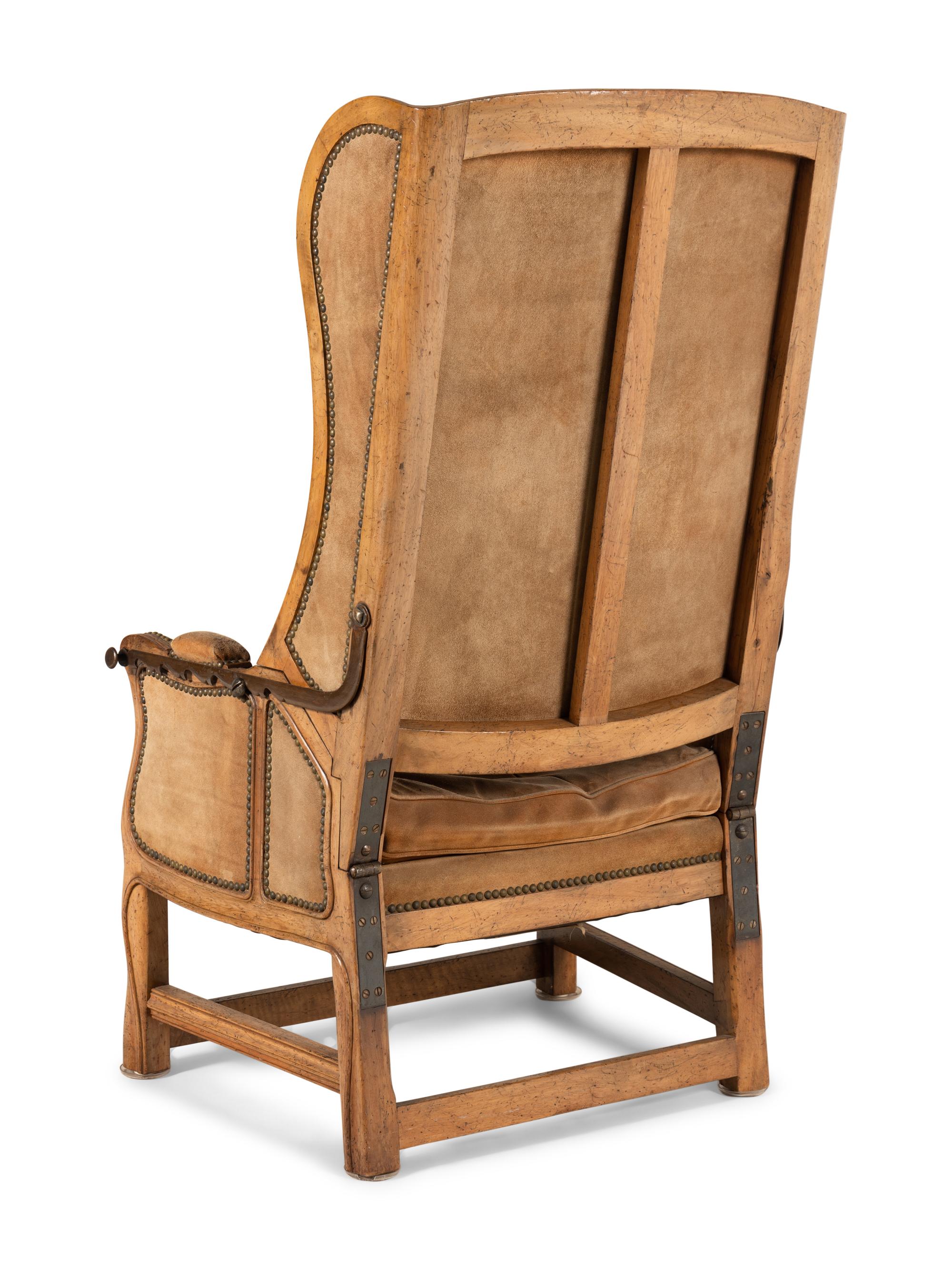 A Louis XV Provincial Style Carved Reclining Easy Chair