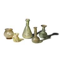 Fifteen Roman and Islamic Glass and Terracotta Vessels