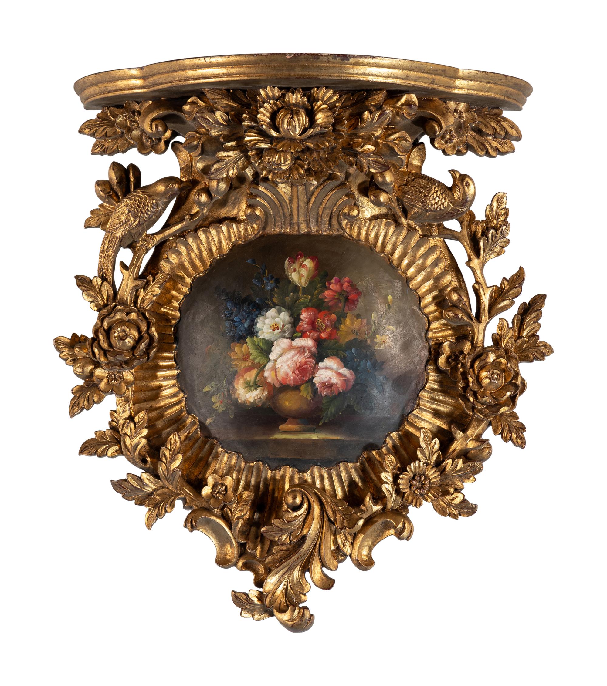 An Italian Painted and Carved Giltwood Wall Bracket