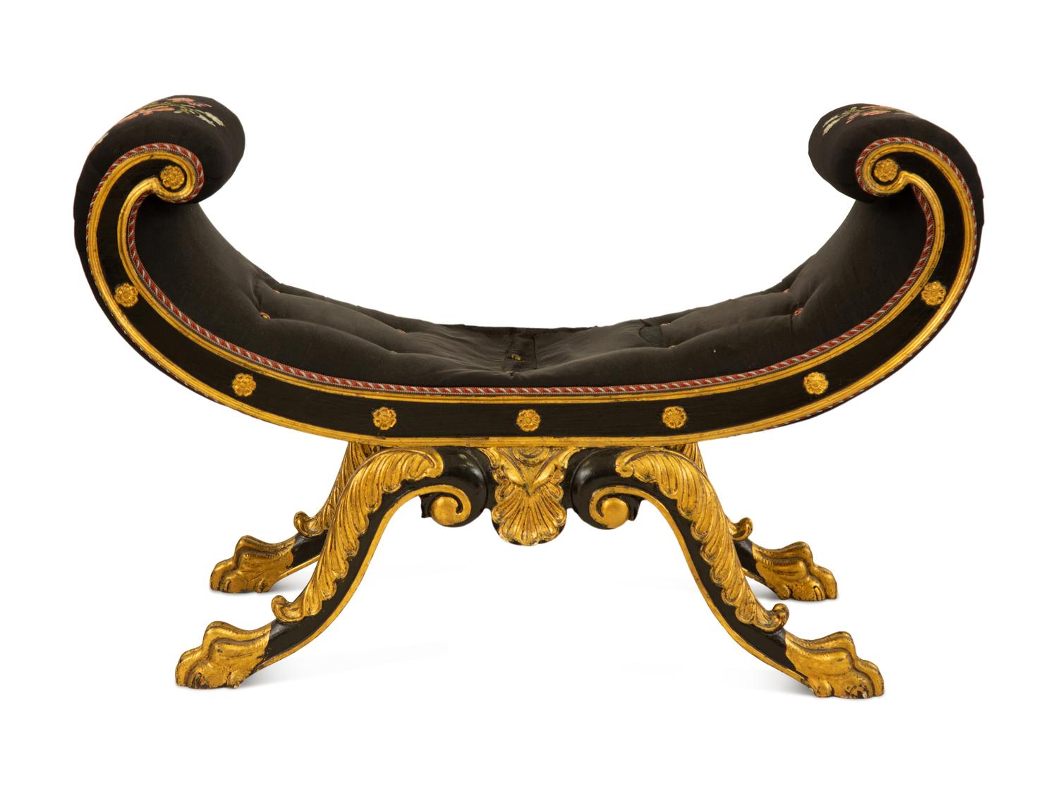 A Regency Ebonized and Parcel Gilt Curule Form Bench