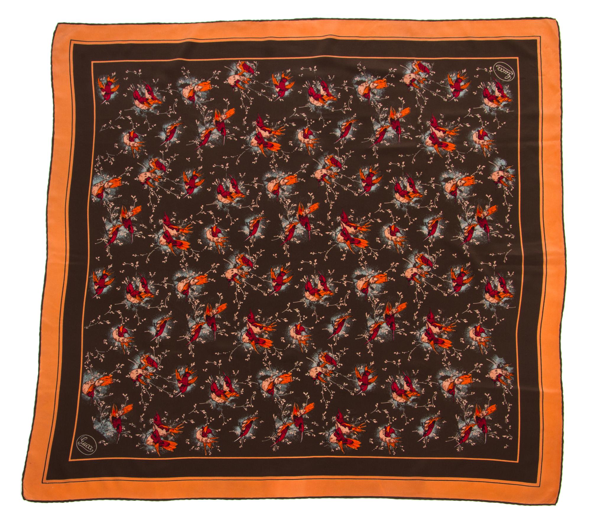 A Gucci Silk Scarf, 34" x 34".