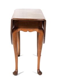 A Drop-Leaf Table Height 27 1/2 inches.