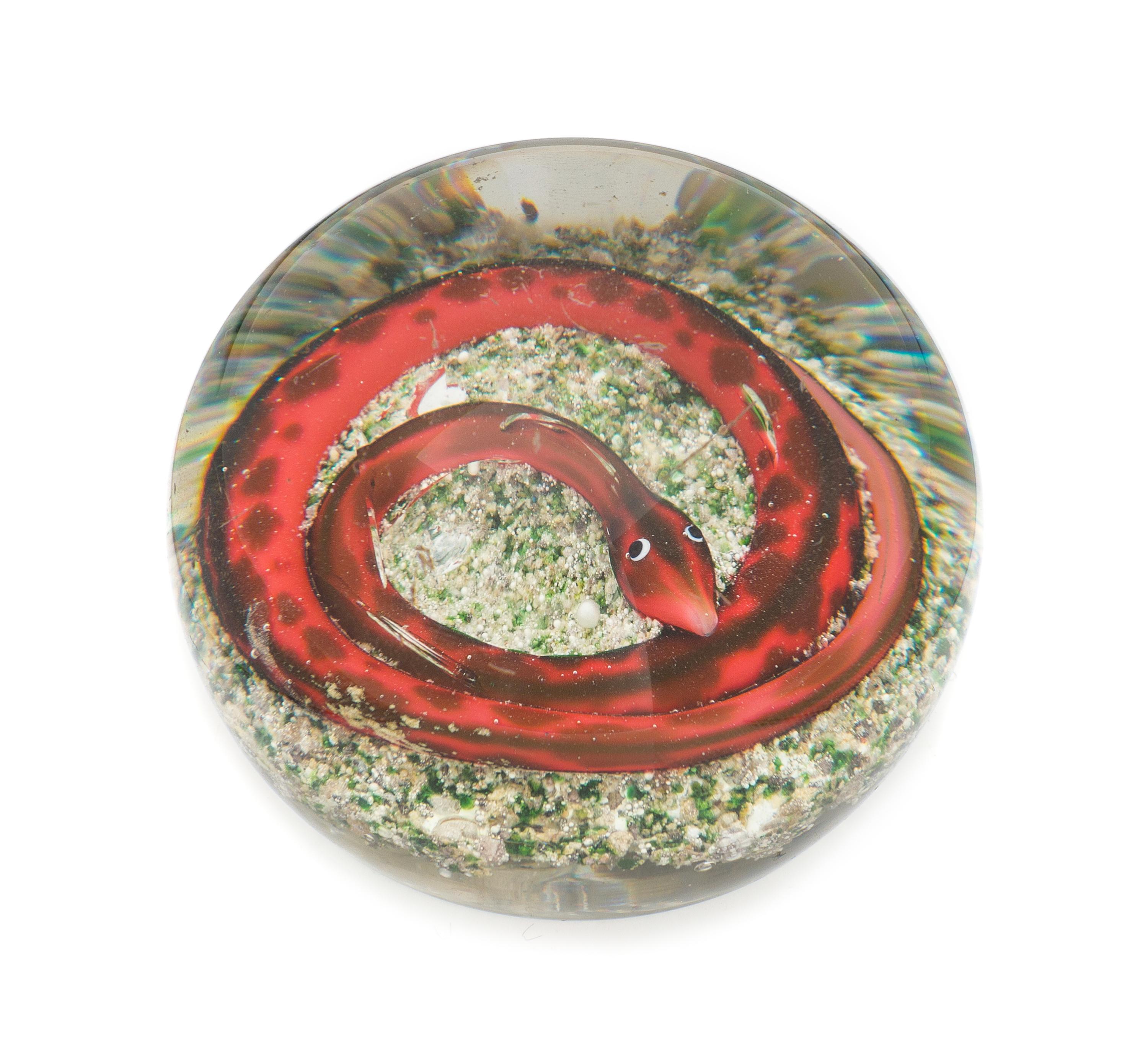 Attributed to Baccarat, , a snake on rock ground paperweight