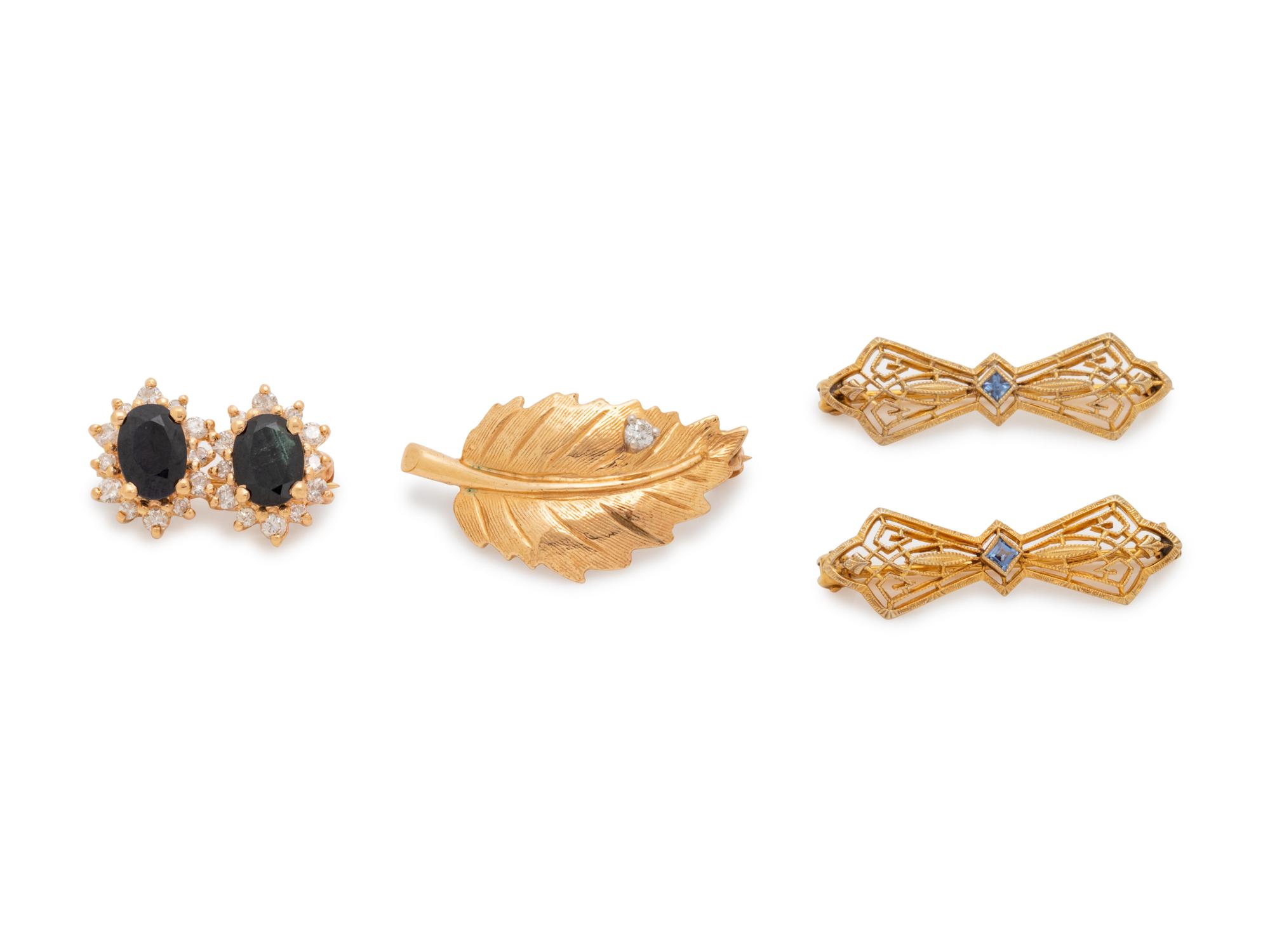 A Collection of Yellow Gold Brooches,