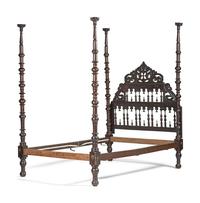 A Gothic Revival Walnut Four Poster Bed