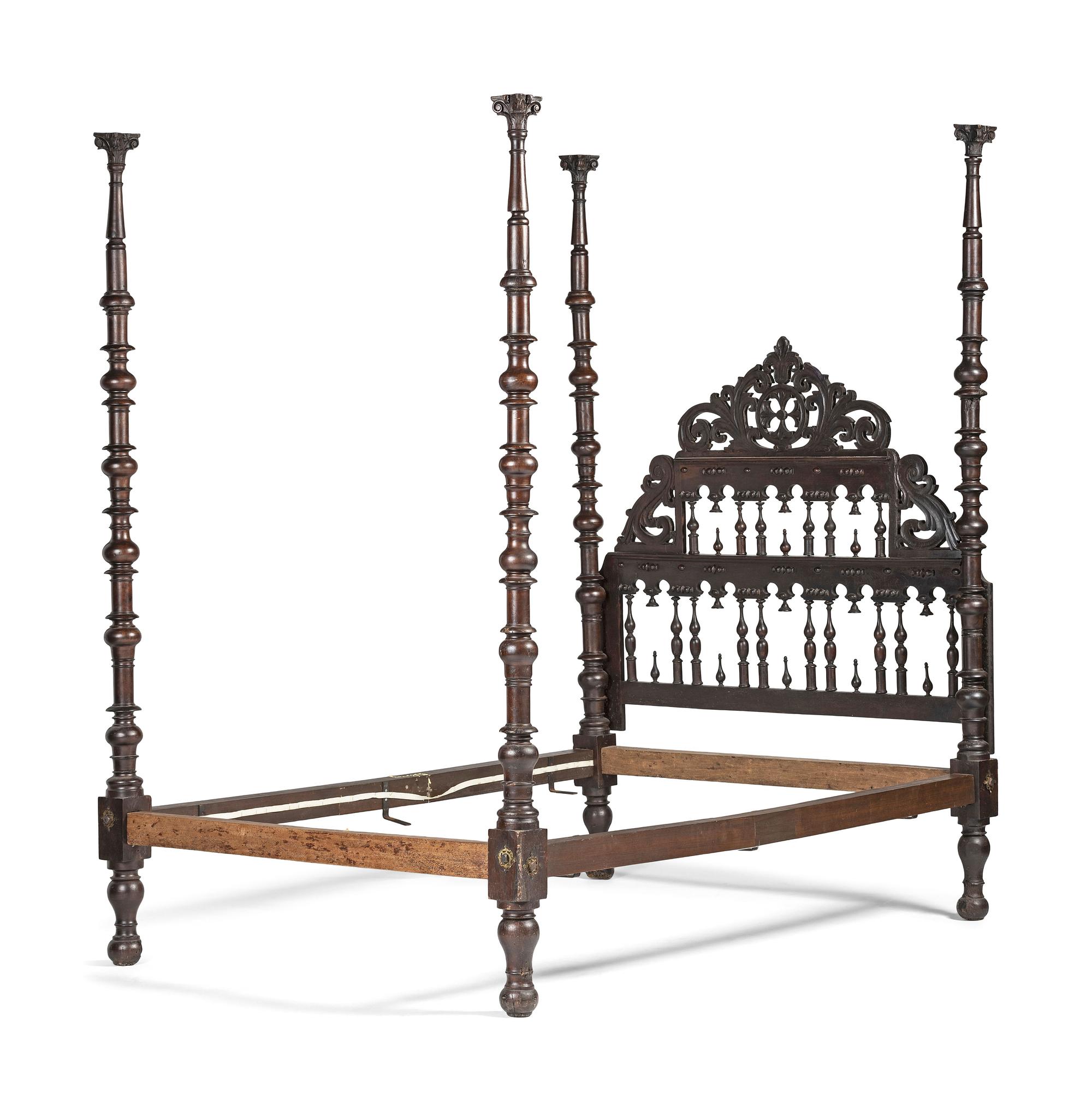 A Gothic Revival Walnut Four Poster Bed