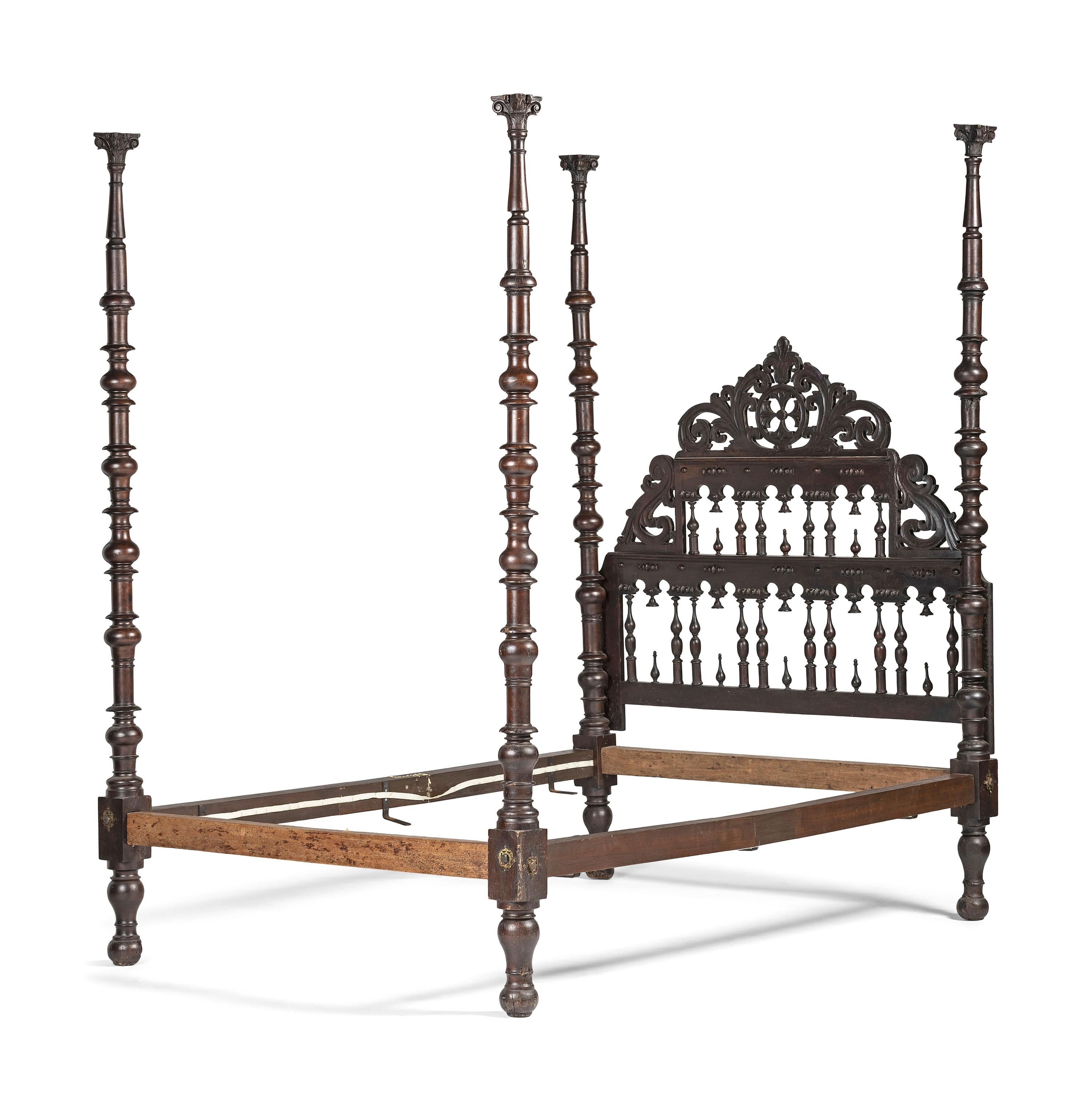 A Gothic Revival Walnut Four Poster Bed
