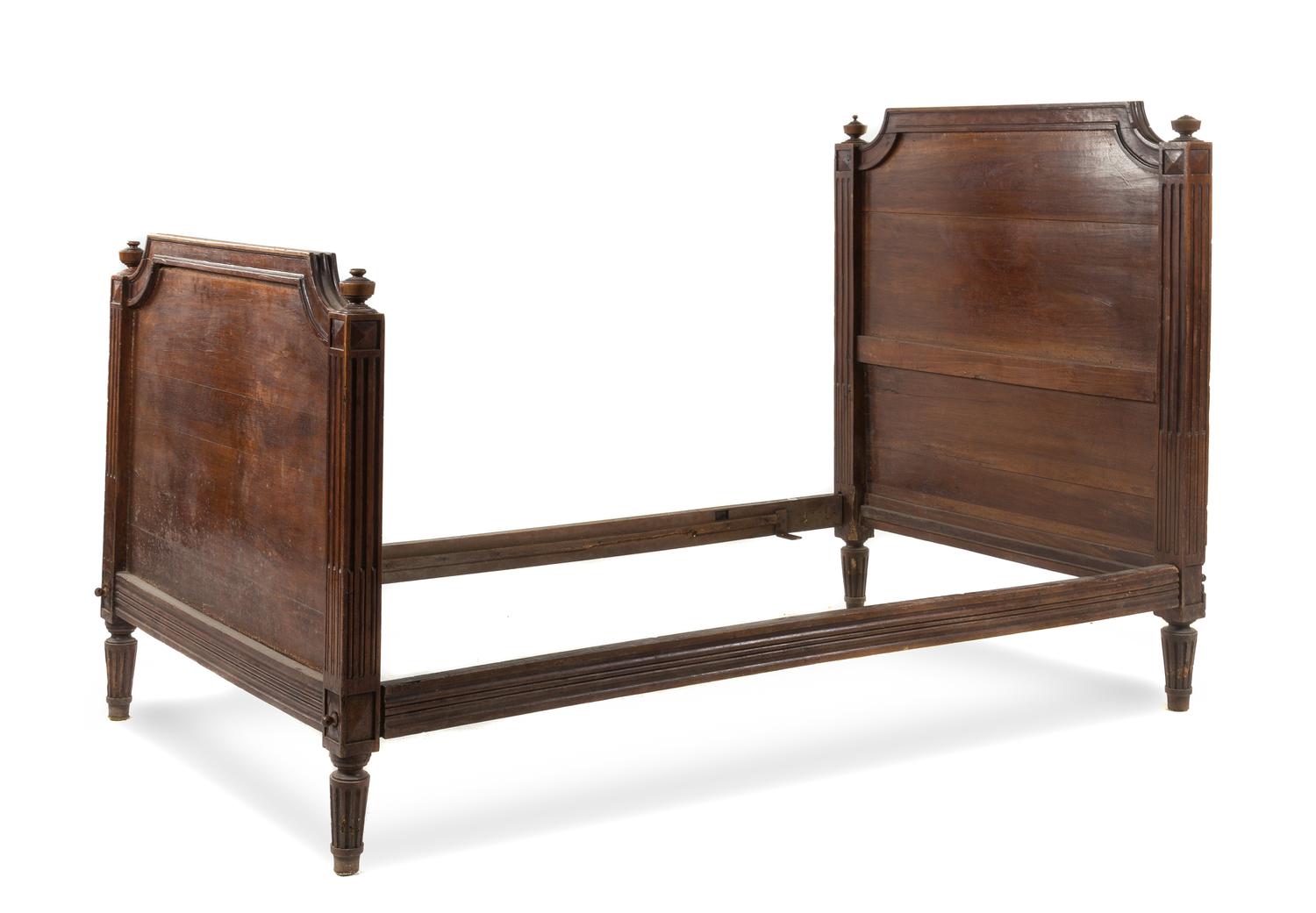 A Louis XVI Style Walnut Bed Height of headboard 51 inches. — 19TH CENTURY