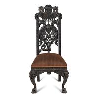 A Renaissance Revival Carved Oak Chair