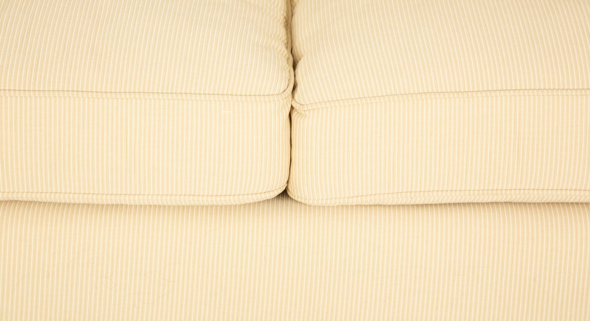 An Art Deco Style Upholstered Sofa — 20TH/21ST CENTURY