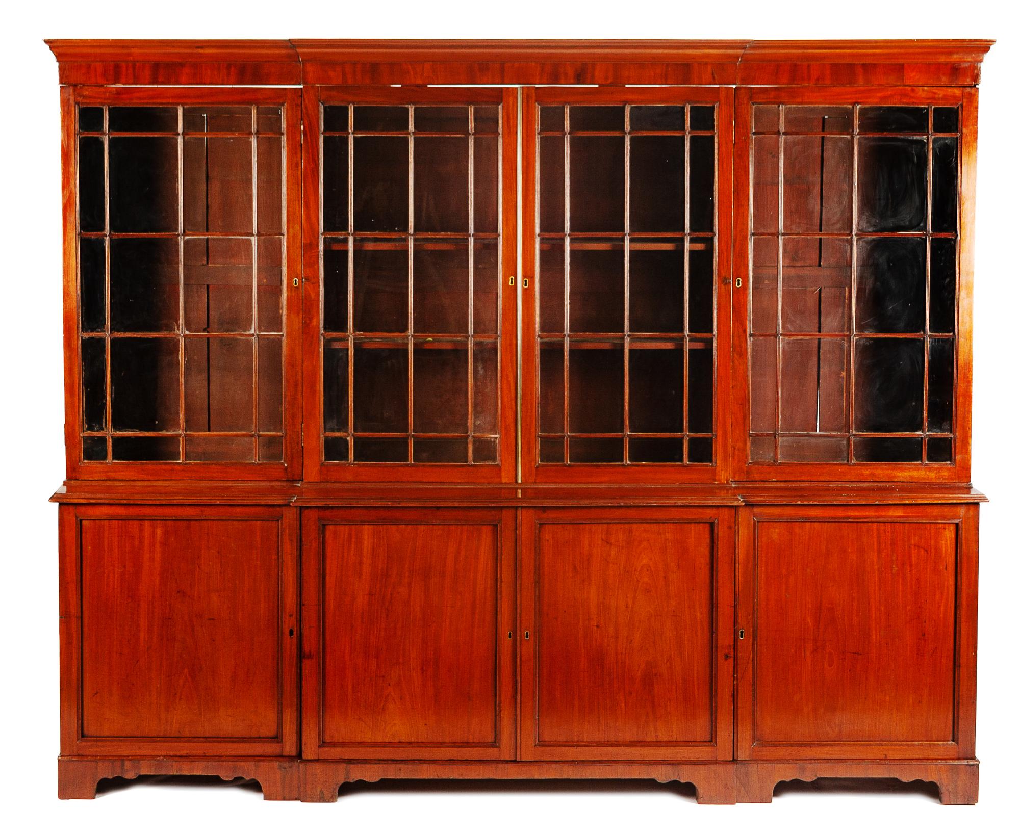 A George III Mahogany Breakfront Bookcase Height 85 x width 103 3/4 x depth 19 1/4 inches. — 18TH/19TH CENTURY