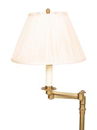 A Group of Four Brass Adjustable Floor Lamps