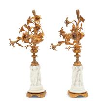A Pair of Gilt Metal Mounted Bisque Porcelain Figural Ornaments
