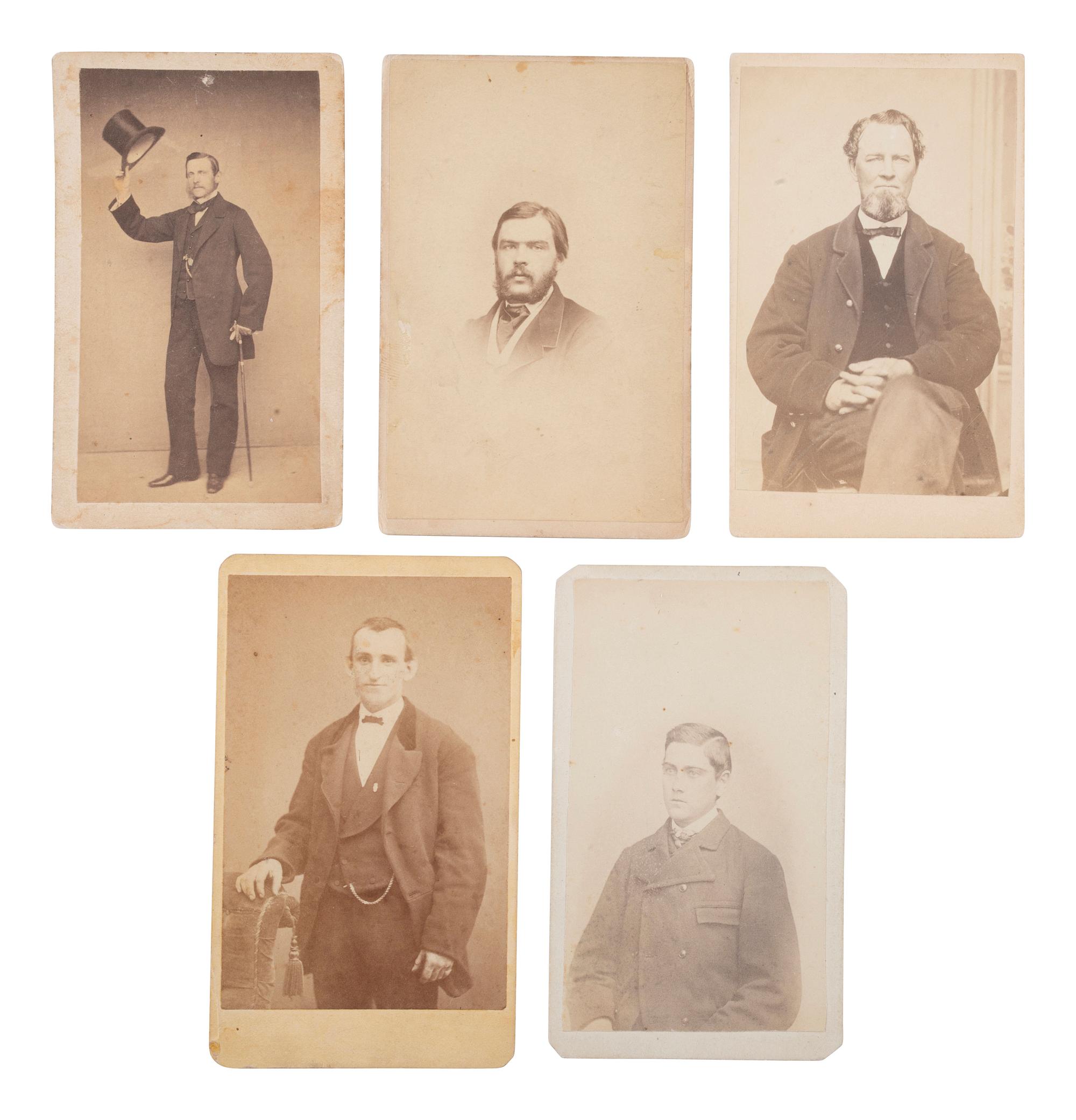 [LINCOLN, Abraham (1809-1865)]. A group of 12 CDVs of political figures, highlighted by a standing portrait of Abraham Lincoln.