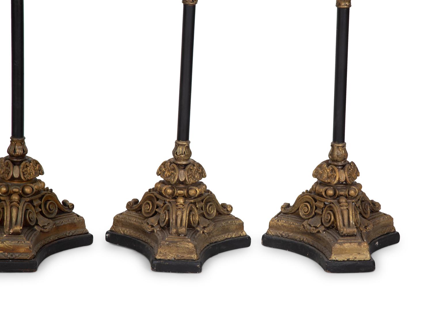 Four Italian Giltwood Gondola Lanterns on Ebonized Supports