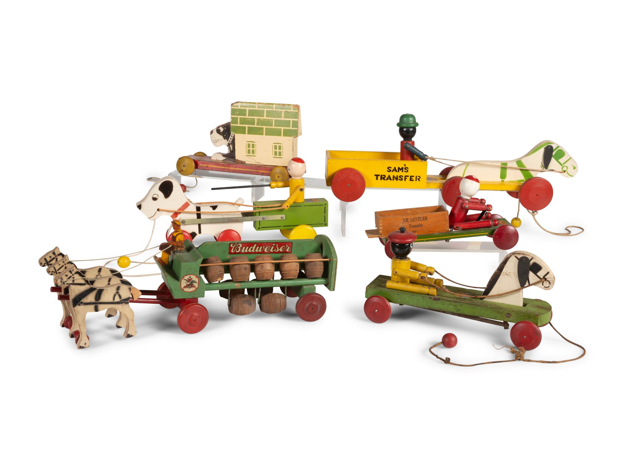 Six Carved Wood Figural Pull Toys