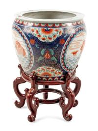 A Chinese Export Porcelain Fishbowl and Wood Stand