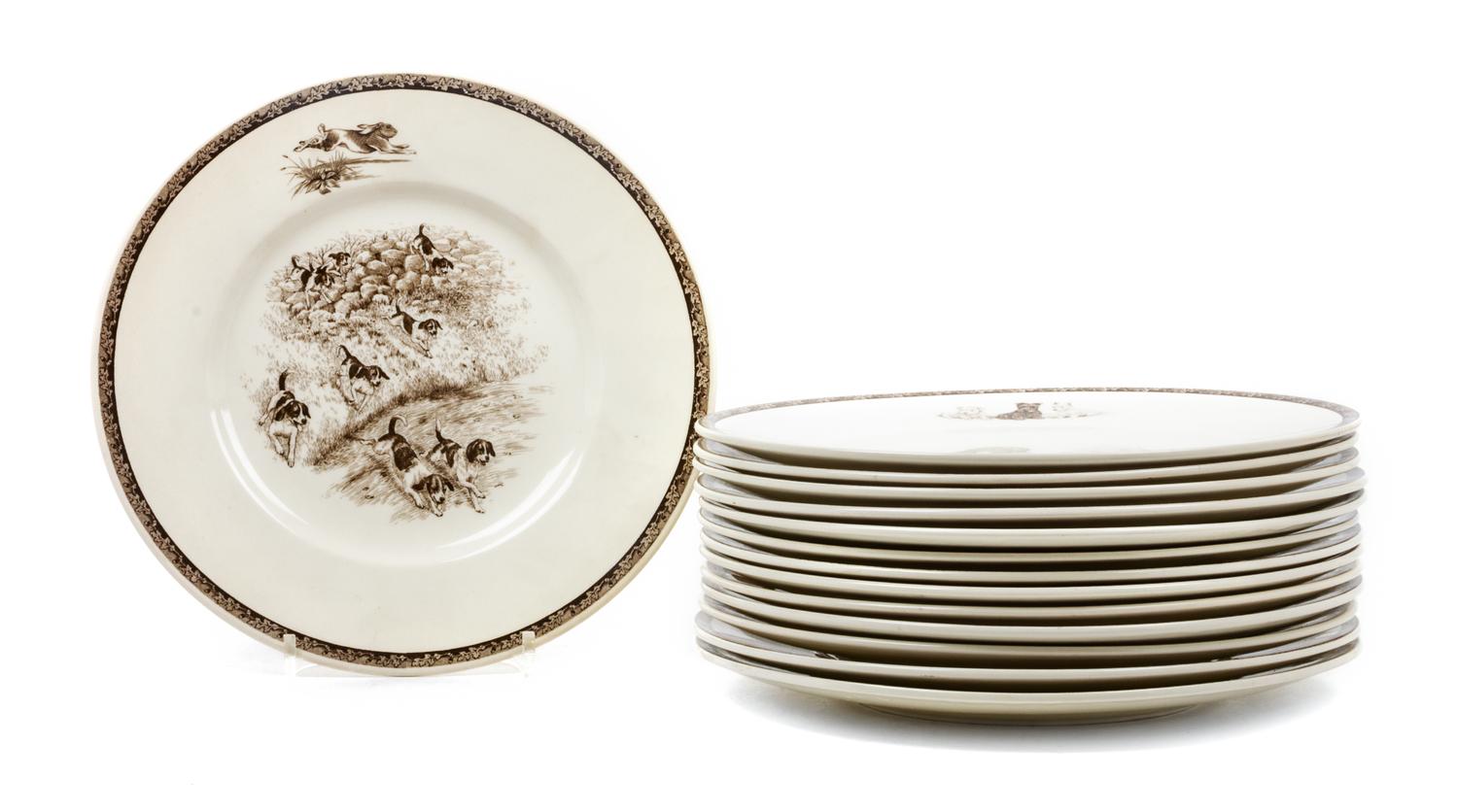Fourteen American Sporting Dog Wedgwood Plates Diameter 10 5/8 inches.