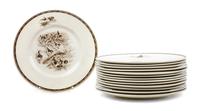 Fourteen American Sporting Dog Wedgwood Plates Diameter 10 5/8 inches.
