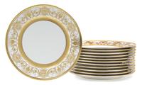 Twelve French Porcelain Plates, Rouard, Diameter 10 1/4 inches.