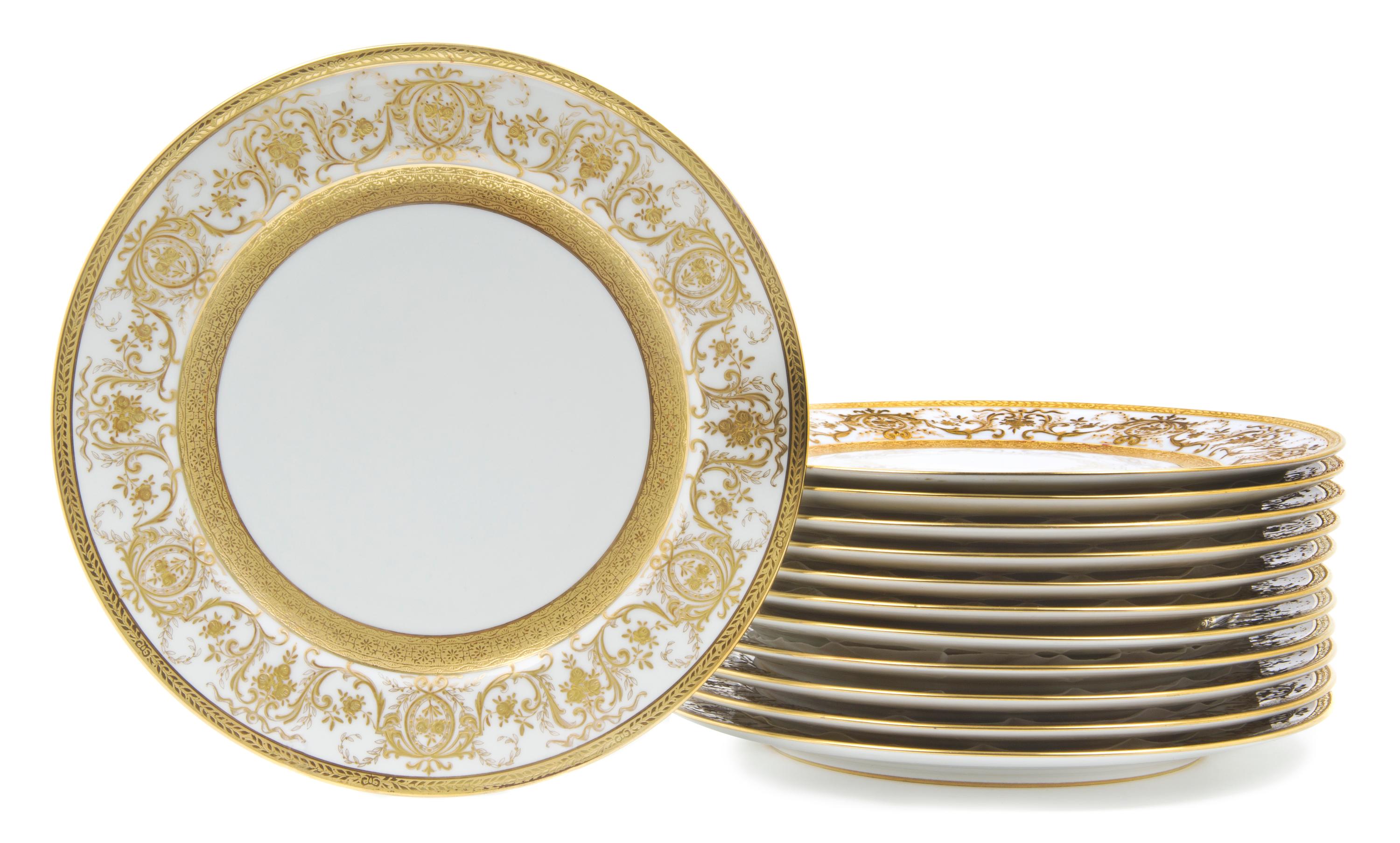 Twelve French Porcelain Plates, Rouard, Diameter 10 1/4 inches.