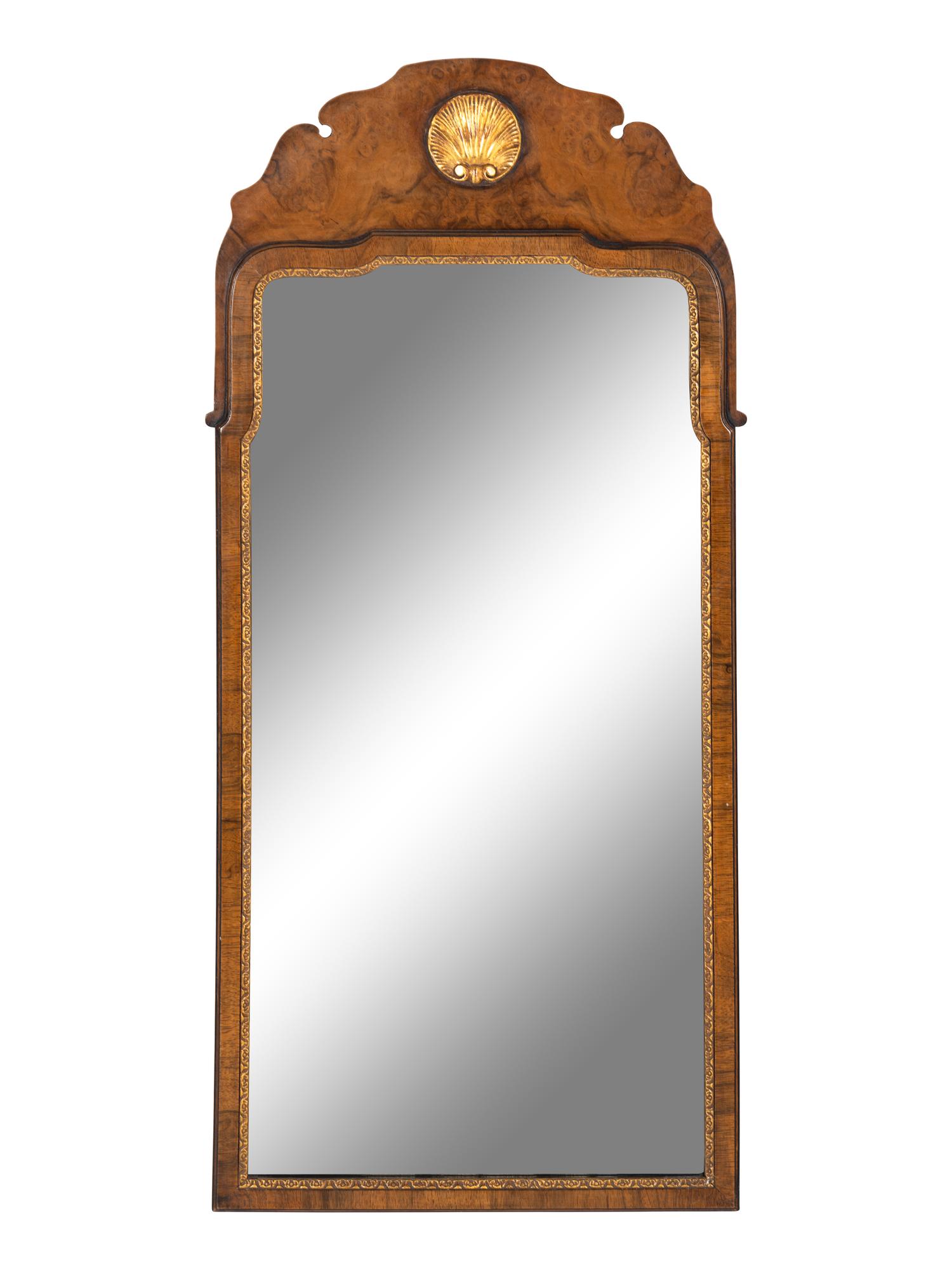 A Regency Style Parcel-Gilt Mahogany Mirror