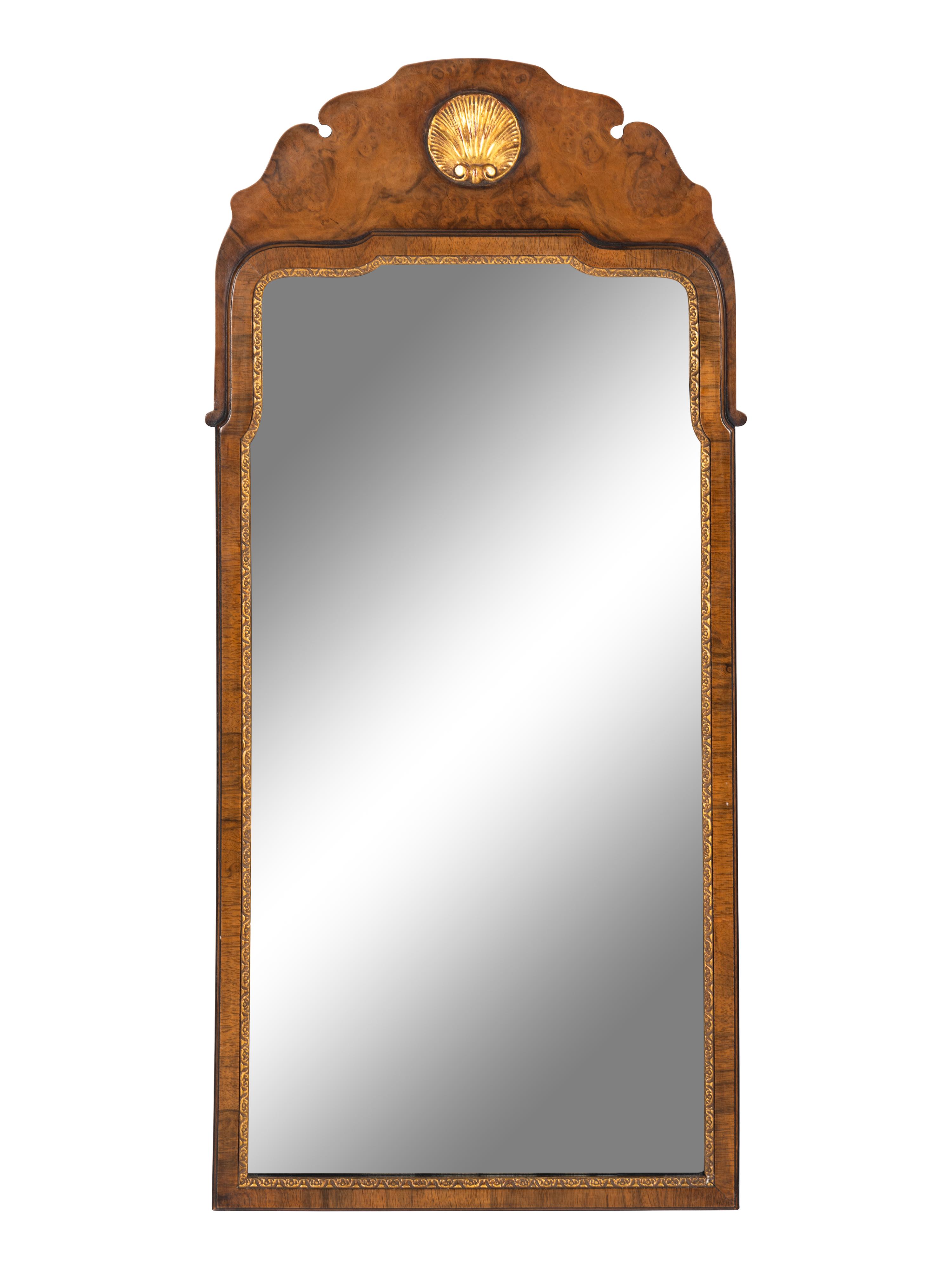 A Regency Style Parcel-Gilt Mahogany Mirror