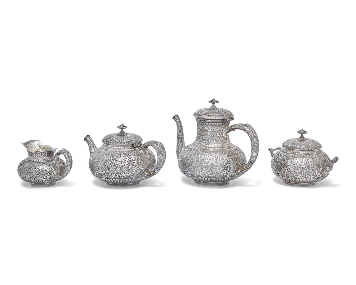 A Five-Piece Sterling Silver Coffee Service in the Persian Taste