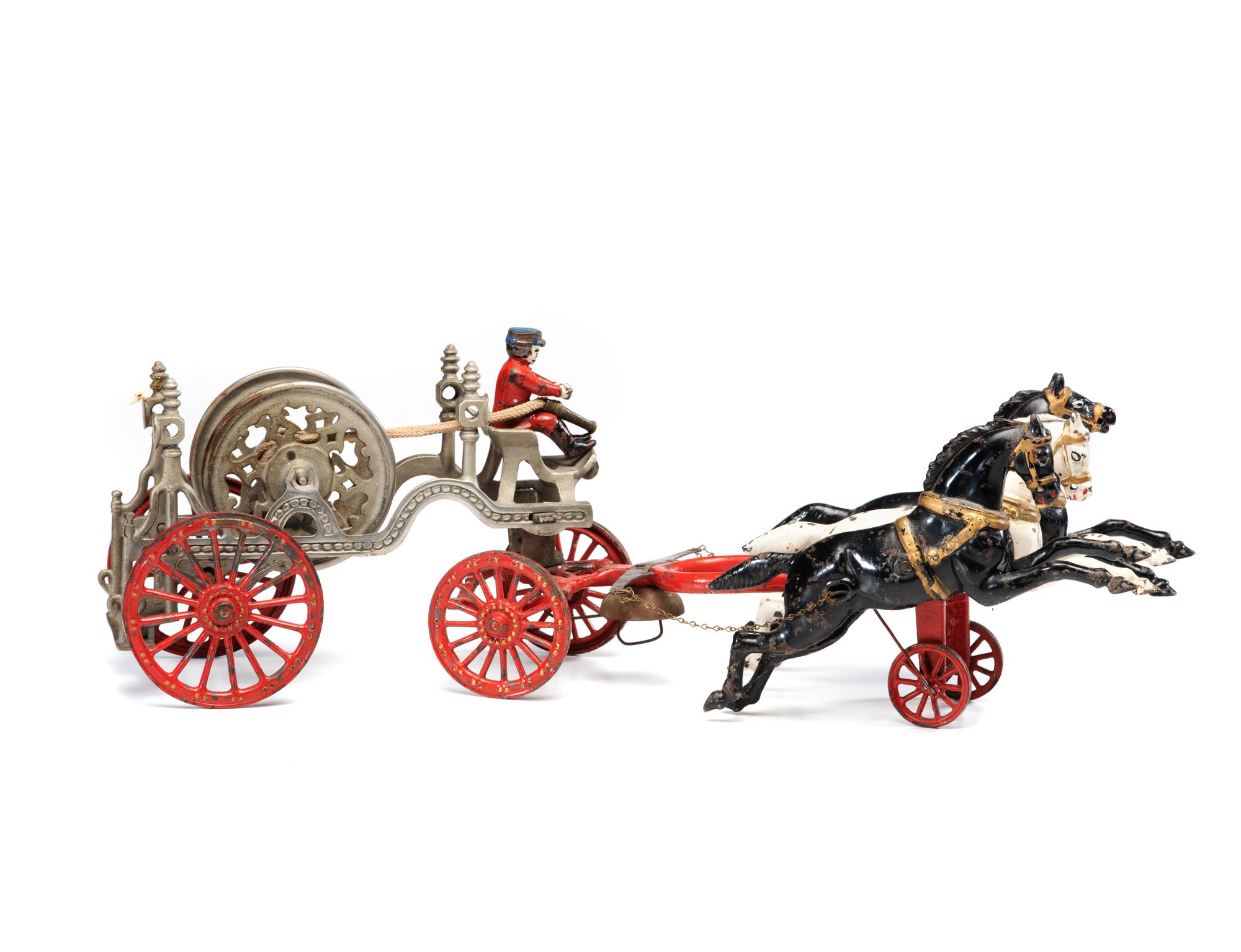 A Painted Cast-Iron Three-Horse Toy Fire Engine