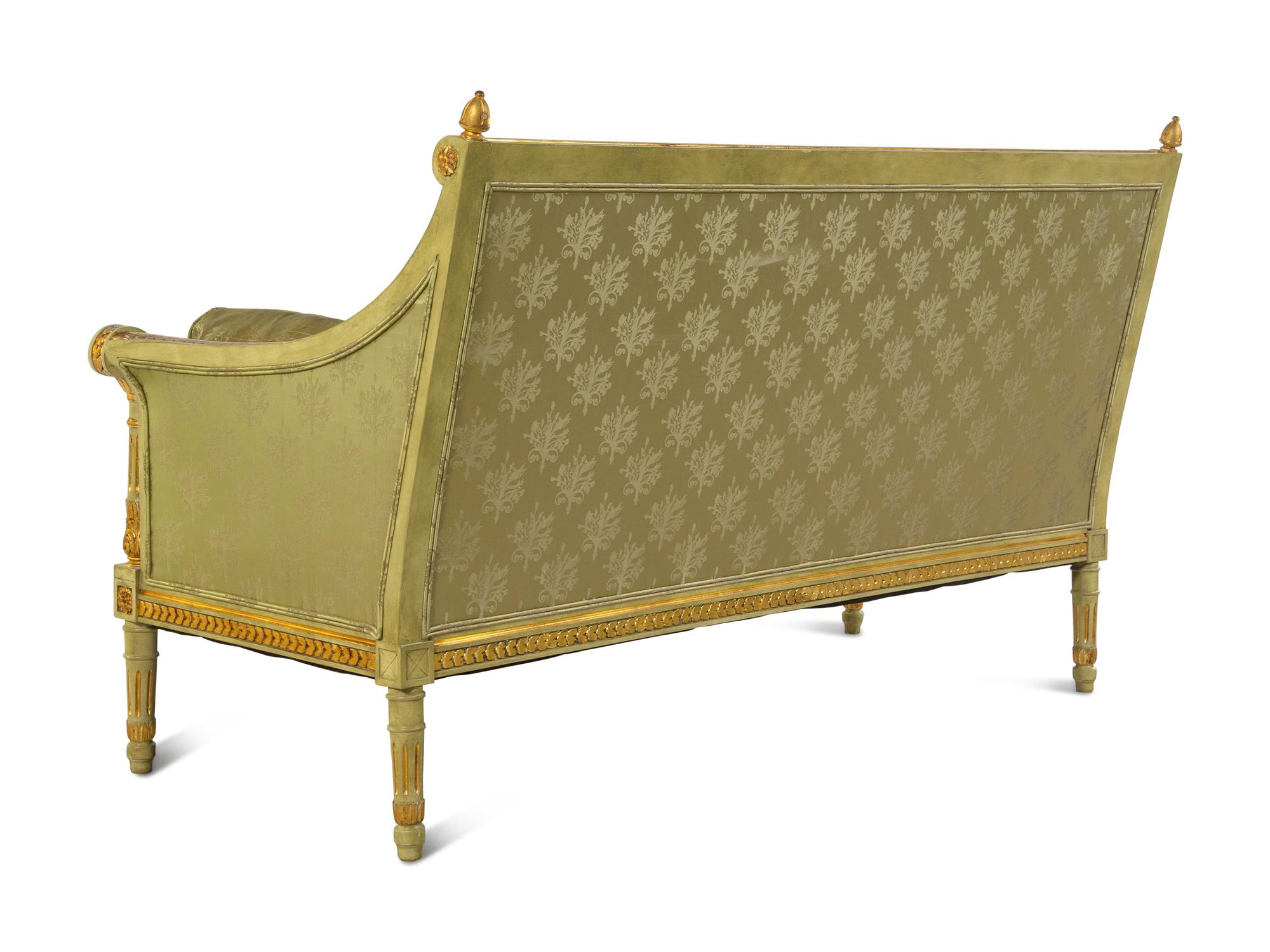 A Louis XVI Style Painted and Parcel Gilt Settee
