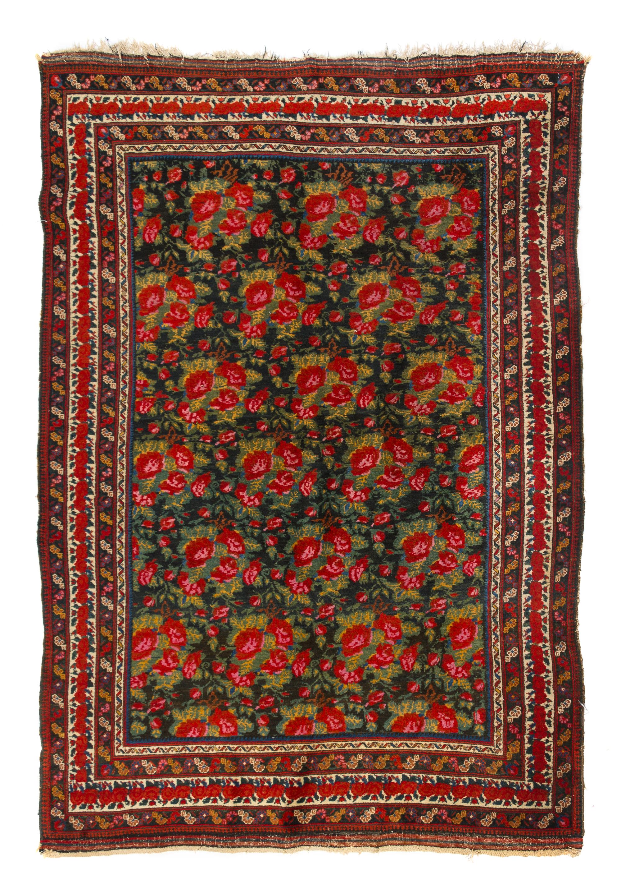 A Shiraz Wool Rug, 4 feet 4 inches x 6 feet 2 inches.