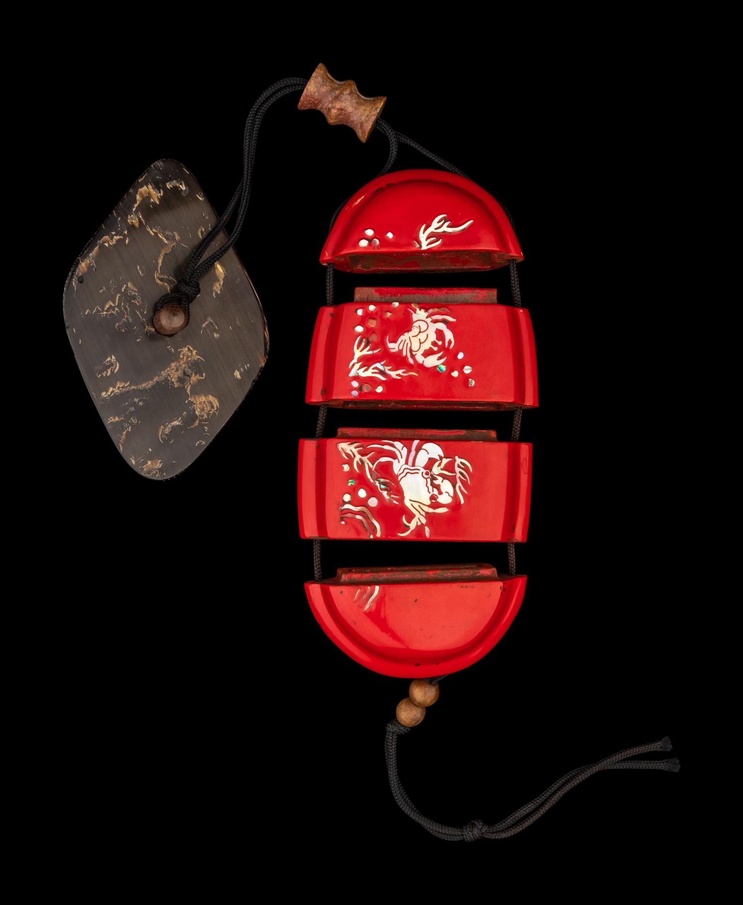 A Japanese Mother-of-Pearl Inlaid Red Lacquer Three-Case Inro