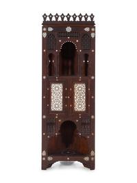 An Ottoman Turkish Carved and Inlaid Corner Cabinet