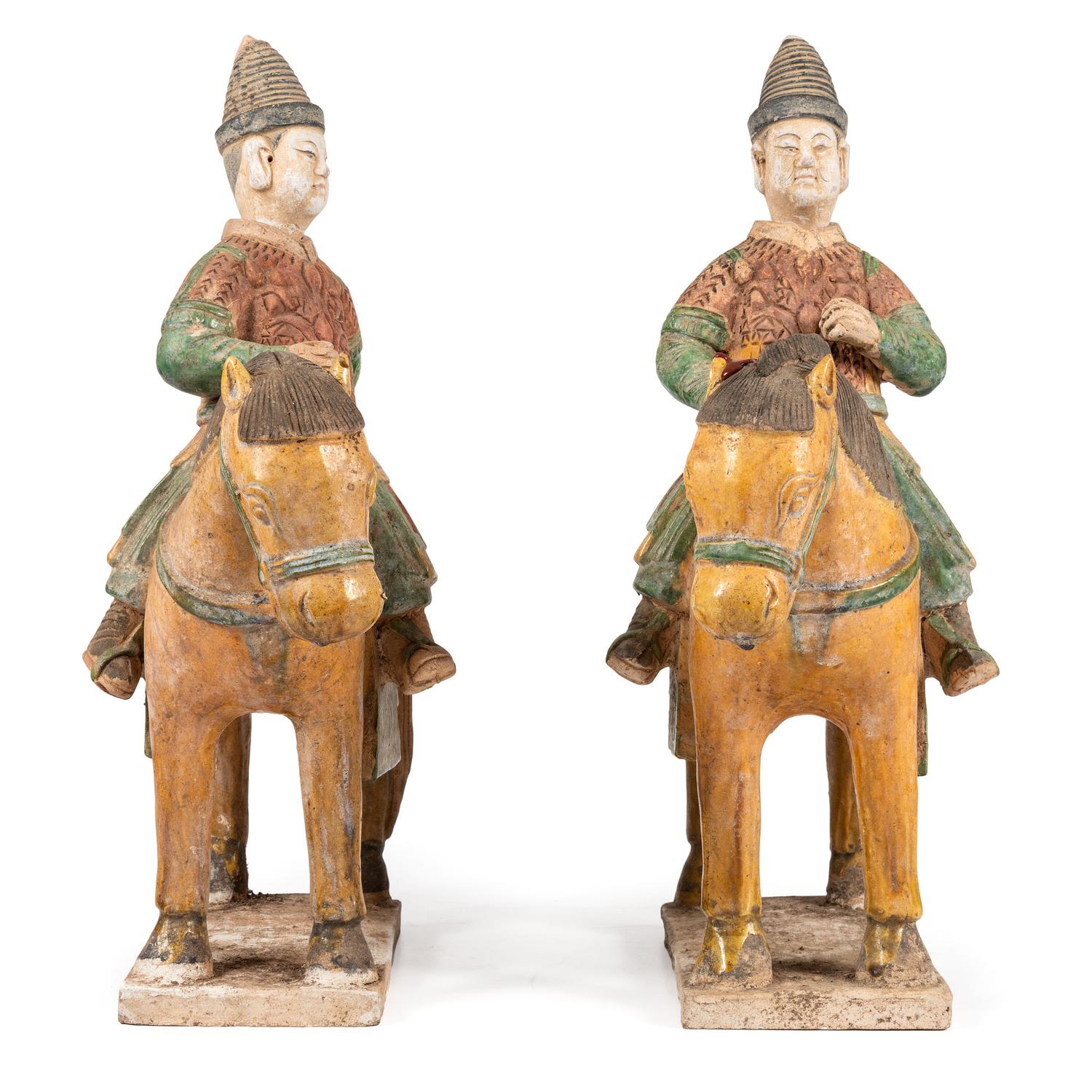 A Pair of Chinese Terracotta Equestrian Figures