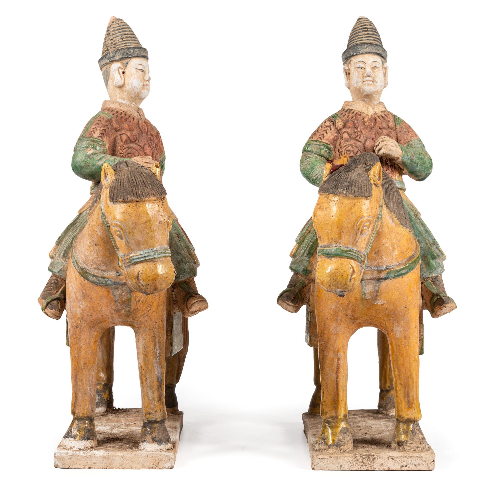A Pair of Chinese Terracotta Equestrian Figures