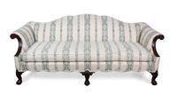 A Chippendale Style Mahogany Camel Back Sofa Height 34 x width 81 x depth 36 inches. — 20TH CENTURY