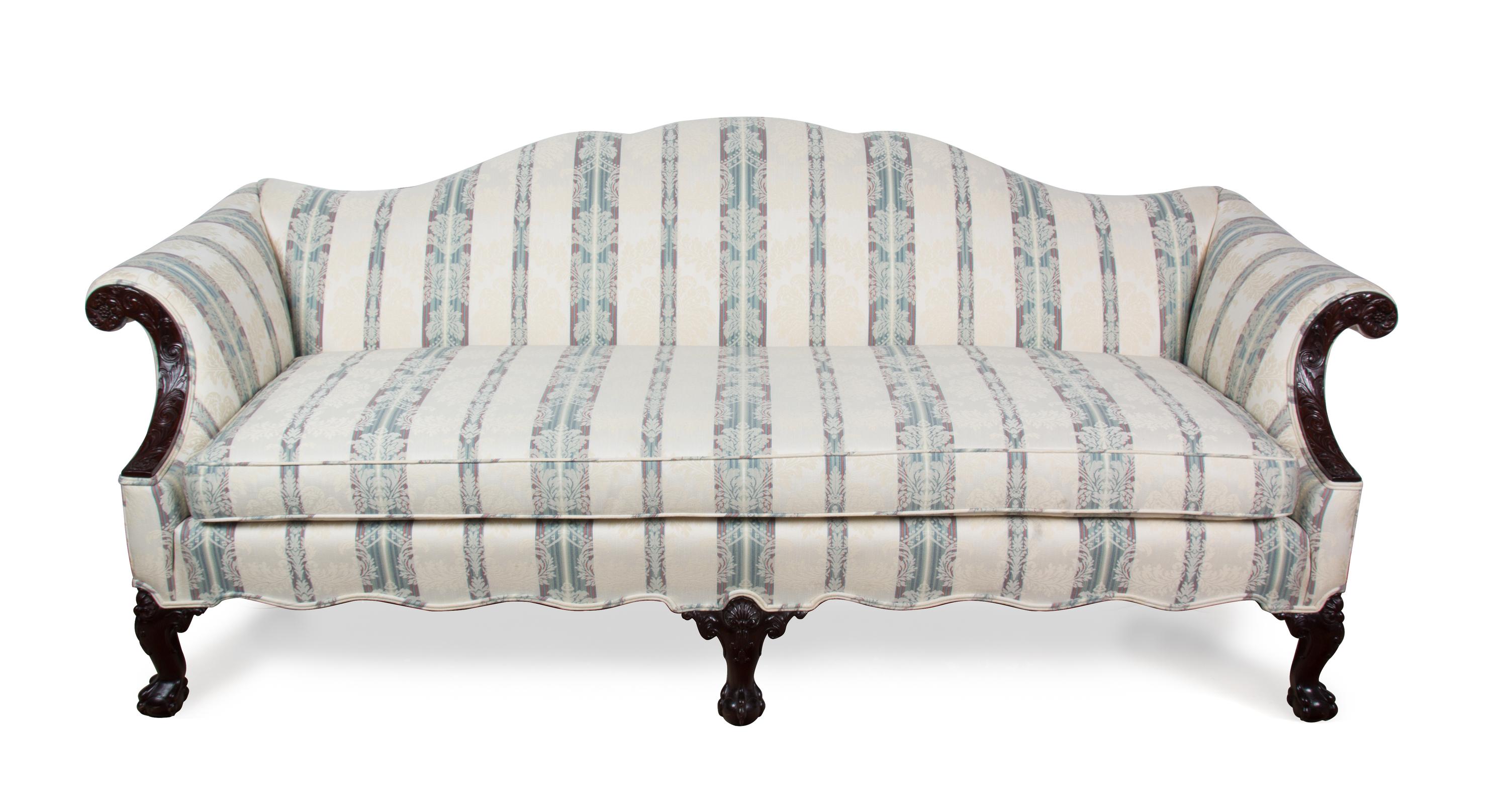 A Chippendale Style Mahogany Camel Back Sofa Height 34 x width 81 x depth 36 inches. — 20TH CENTURY