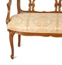A Continental Painted and Giltwood Settee