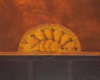 A fine pair of George III inlaid mahogany demilune card tables, circa 1790