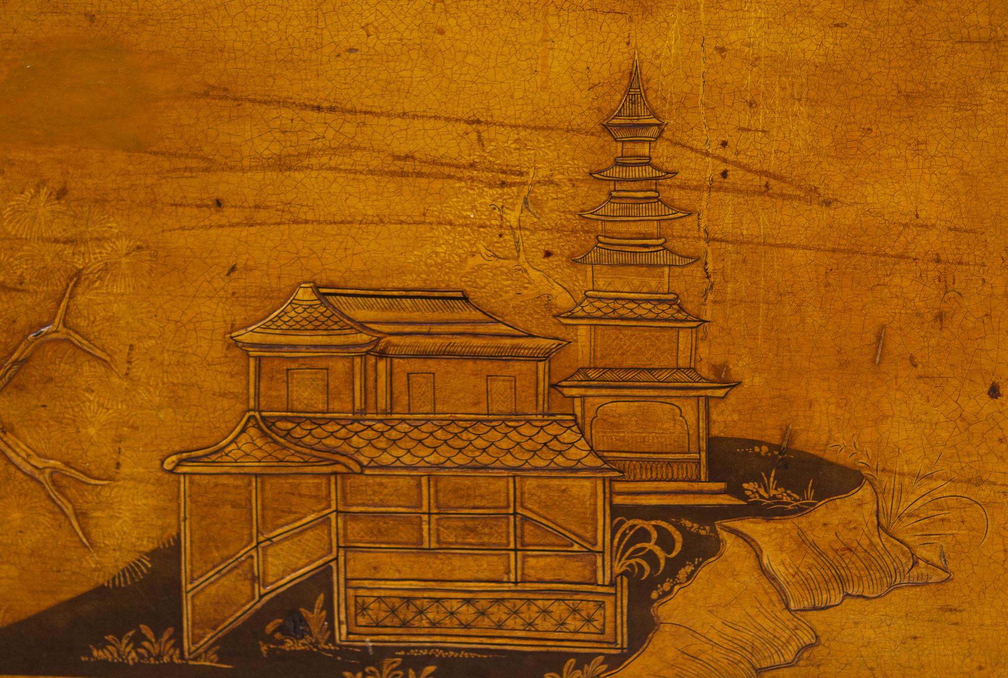 A Chinoiserie Decorated Trunk on Stand