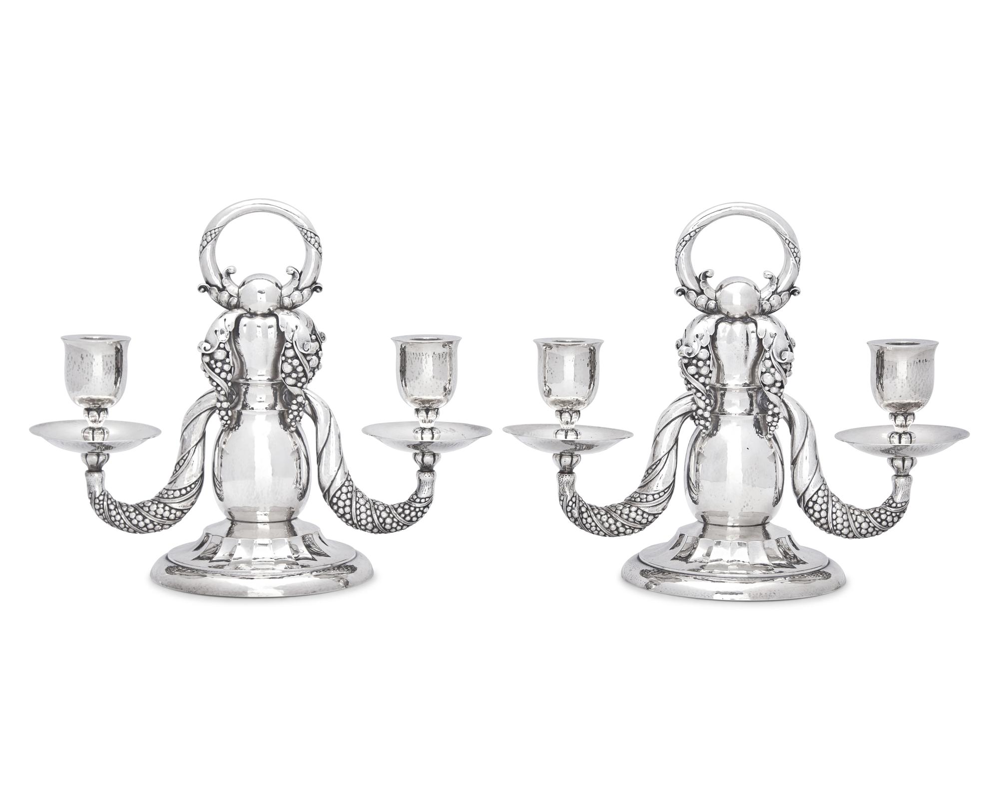 A Pair of Georg Jensen Silver Two-Light Candelabra