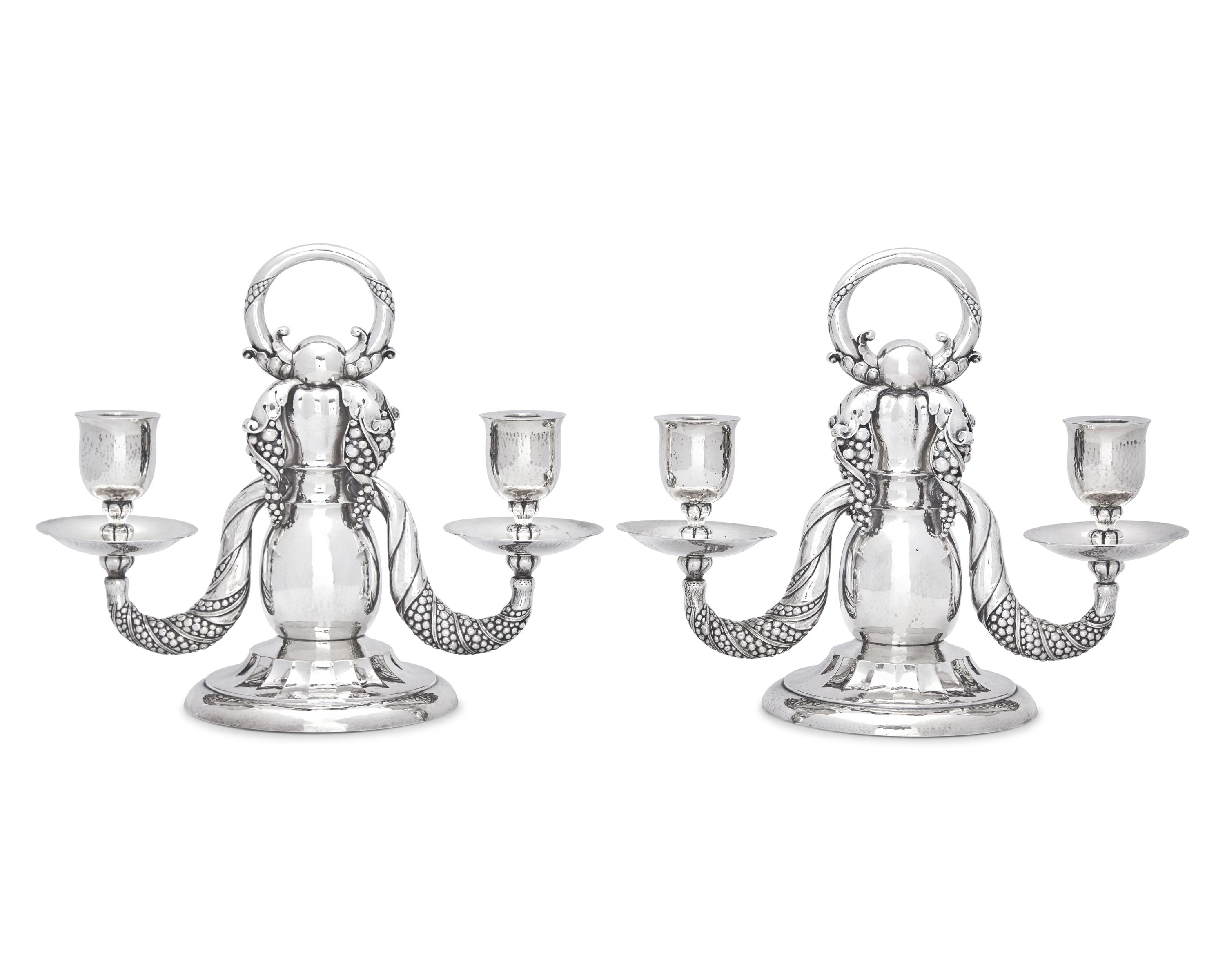 A Pair of Georg Jensen Silver Two-Light Candelabra