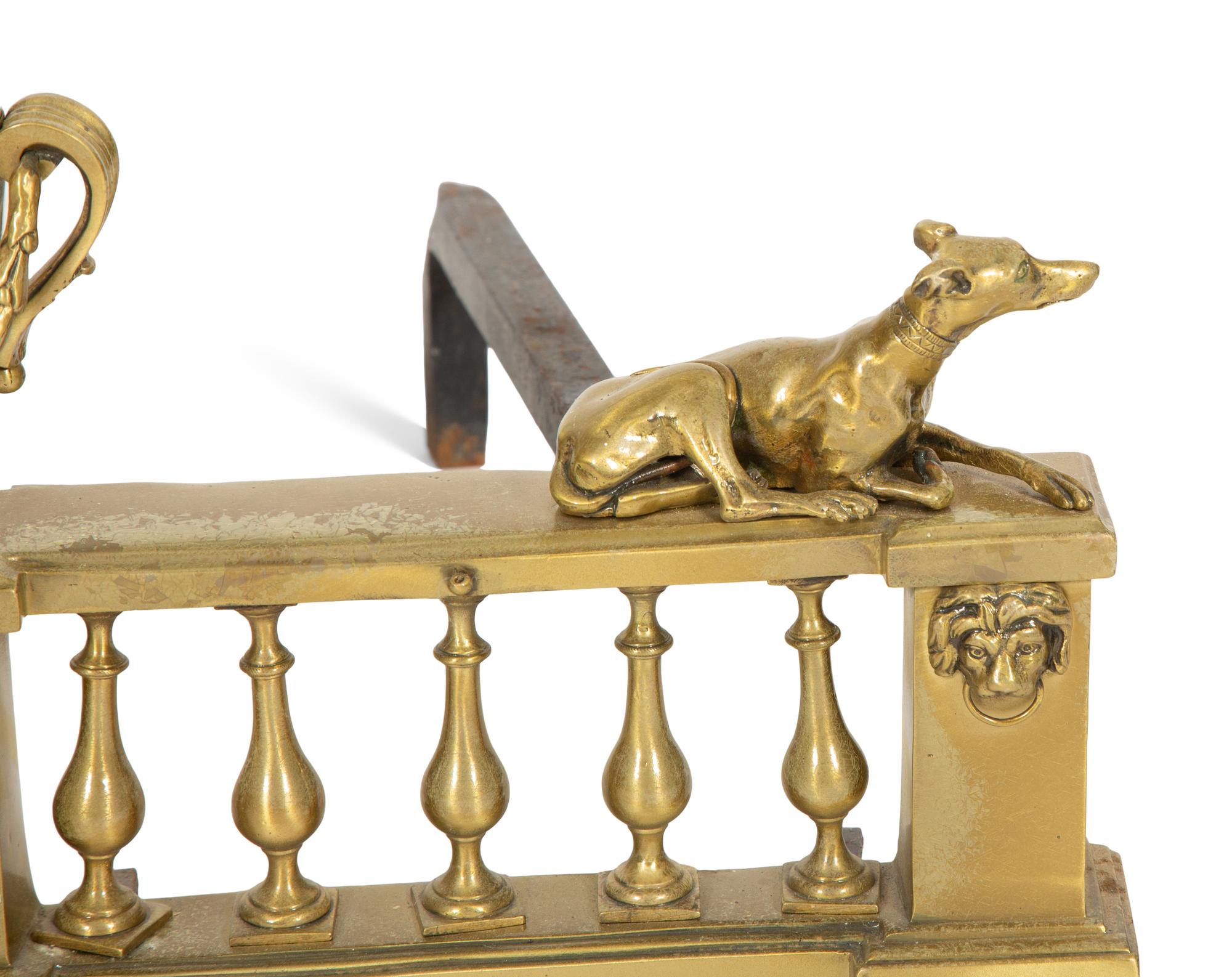 A Pair of French Brass Chenets with Recumbent Dogs
