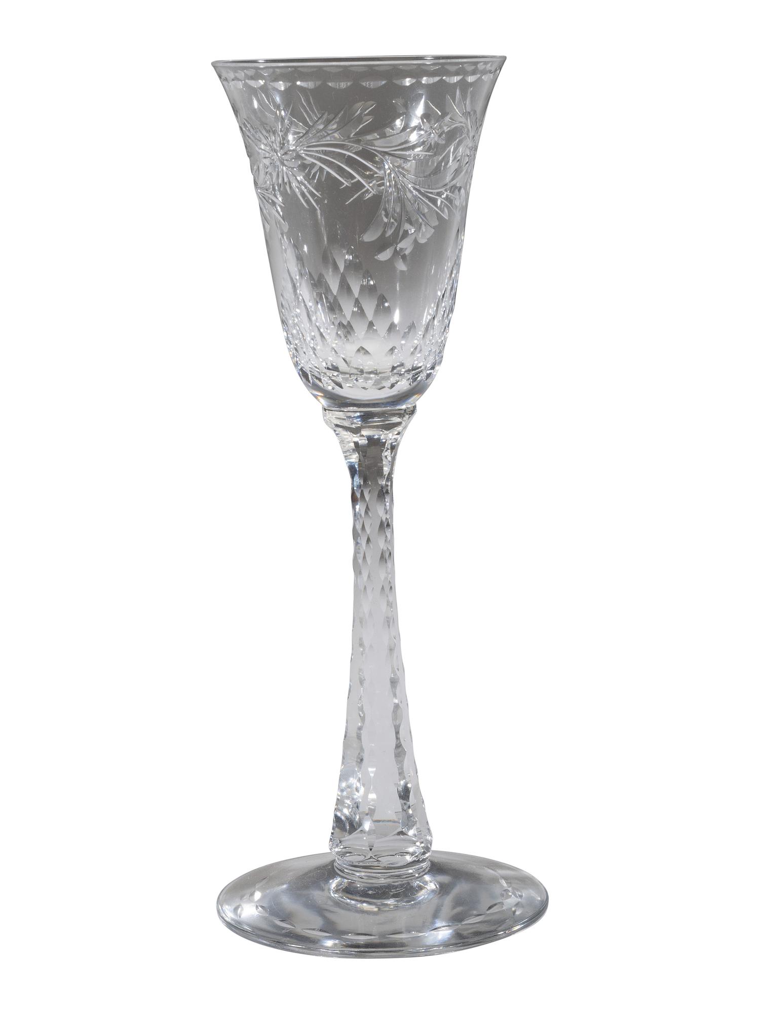 A Collection of Cut Glass Stemware and Plates