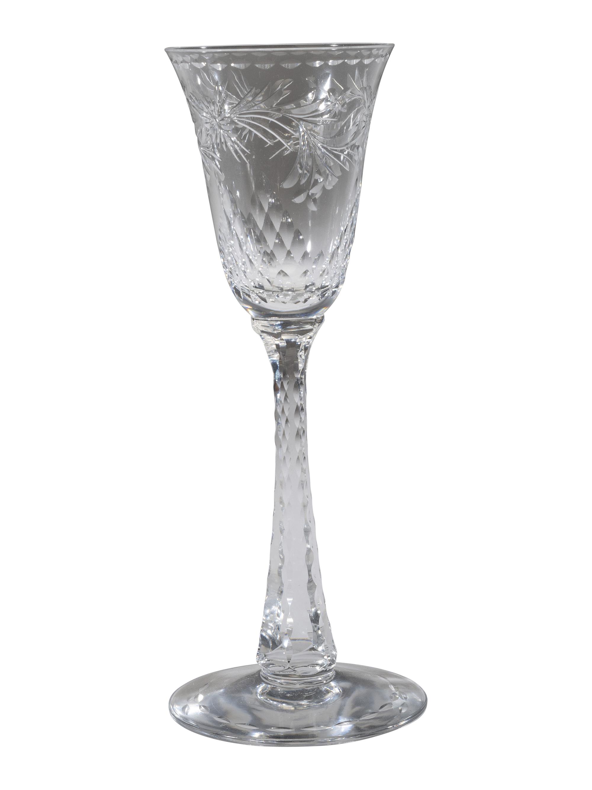 A Collection of Cut Glass Stemware and Plates