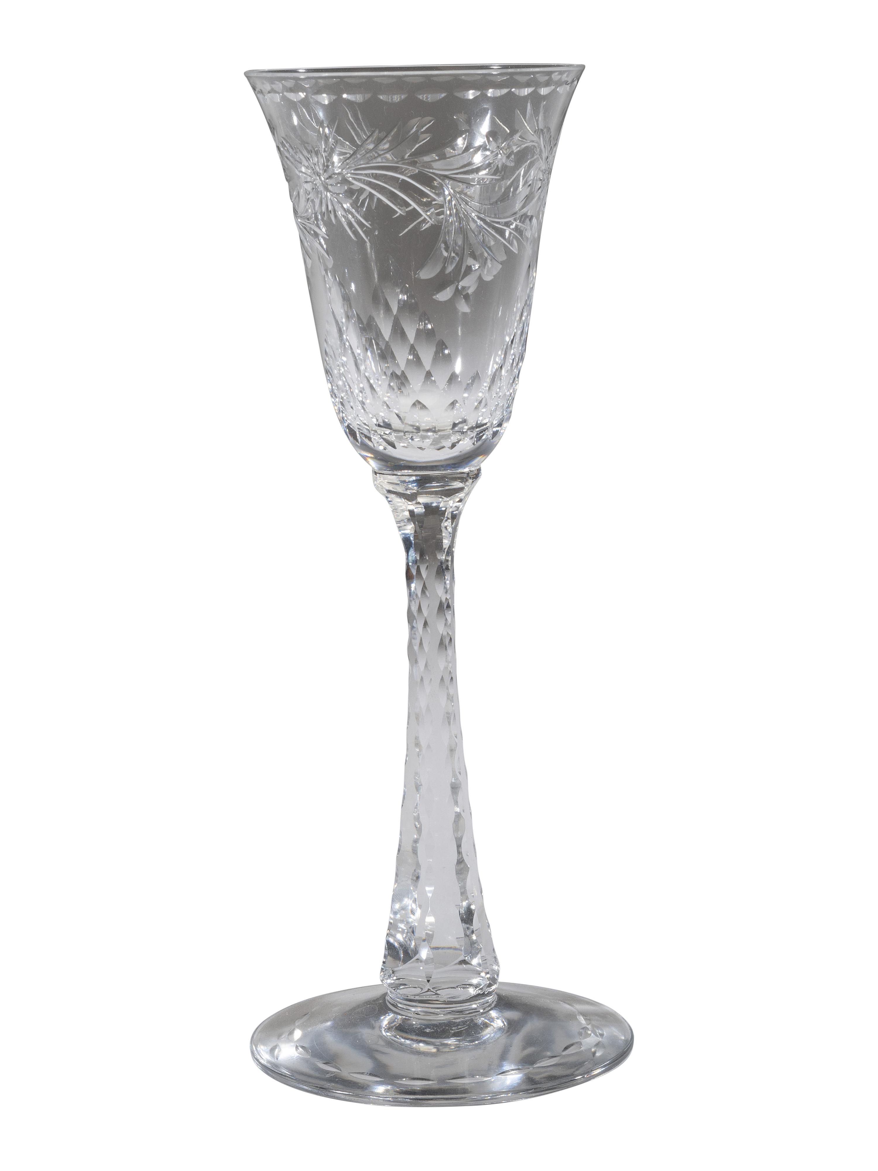 A Collection of Cut Glass Stemware and Plates