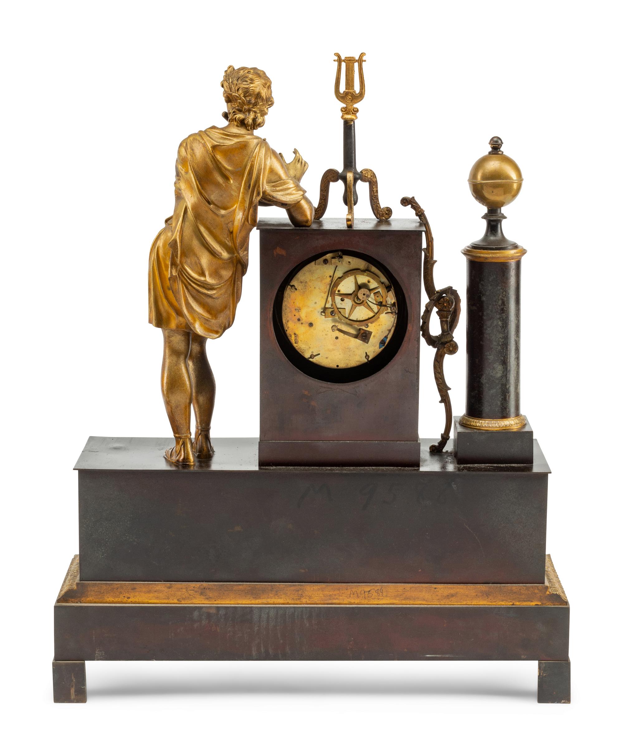 A Louis Philippe Gilt and Patinated Bronze Figural Mantel Clock
