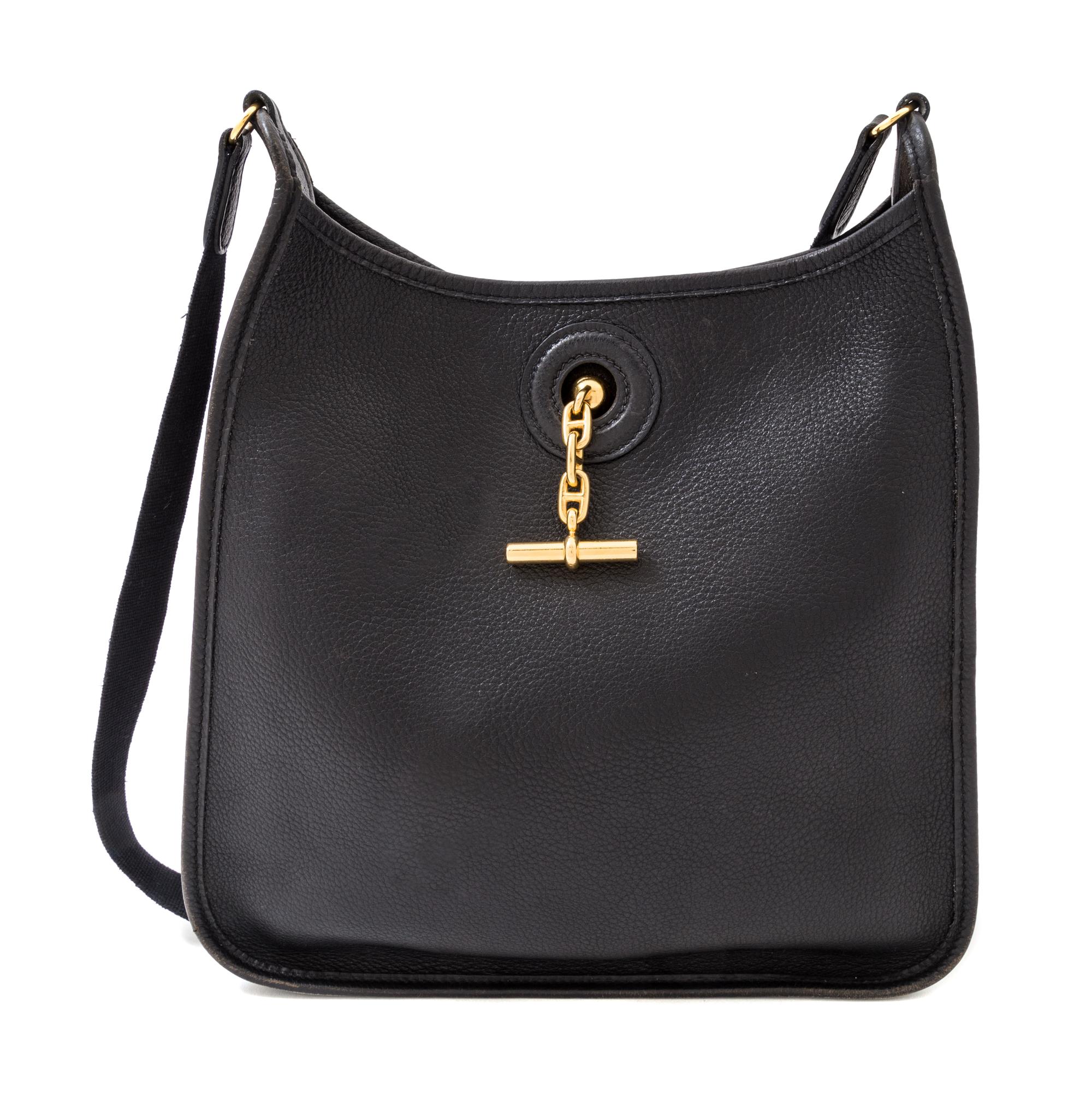 An Hermes Black Leather Vespa Bag, 11" x 11" x 3"; Strap drop: 18.5".