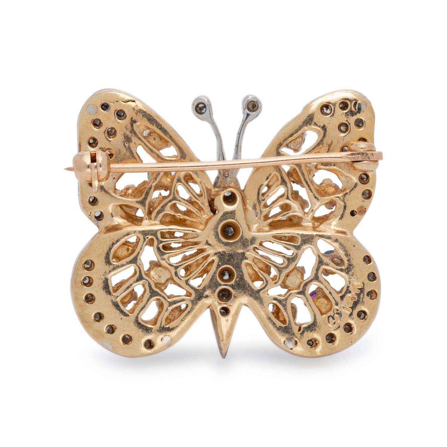 COLLECTION OF GEMSTONE AND DIAMOND BROOCHES