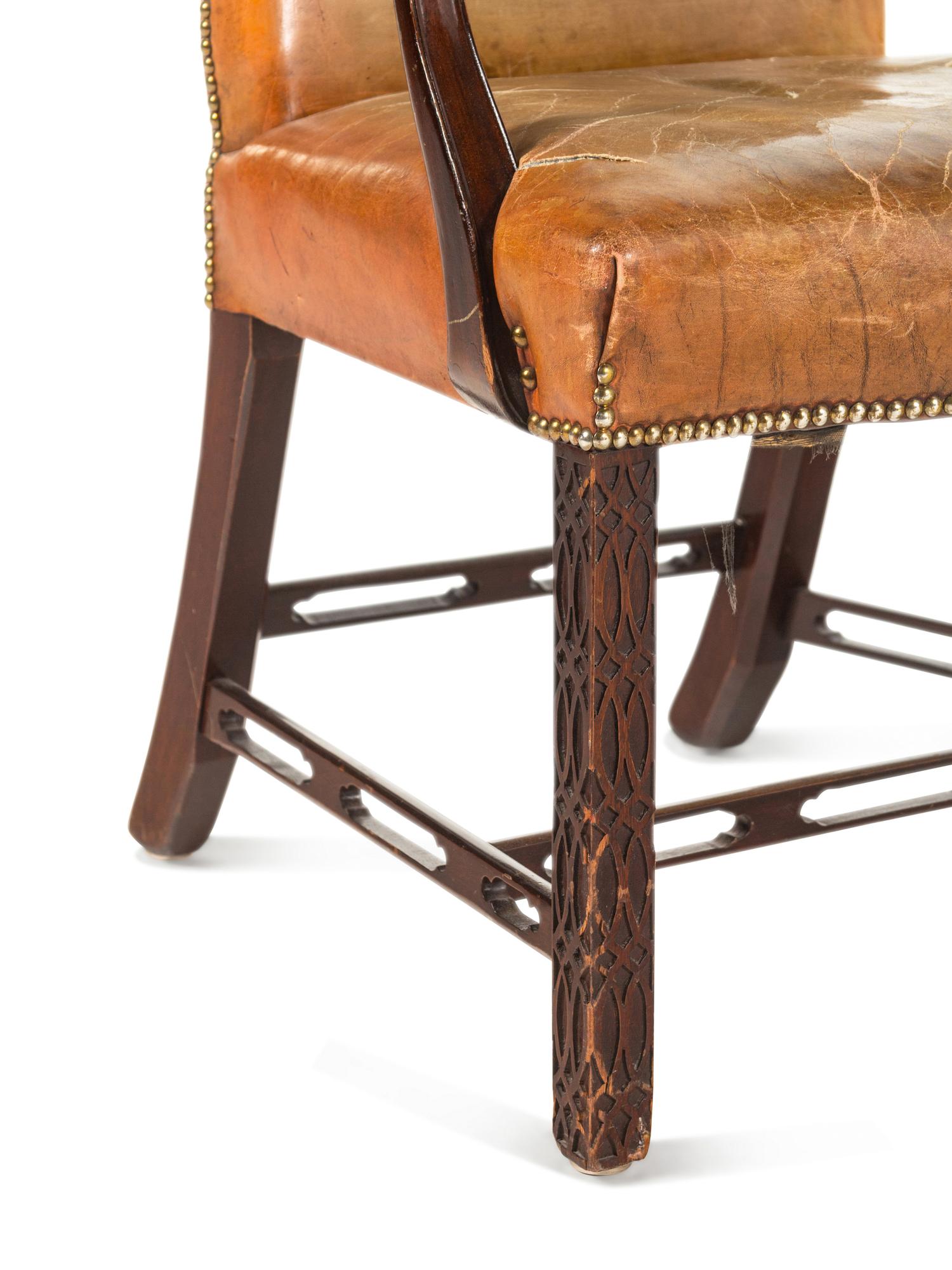 A Pair of George III Style Leather-Upholstered Mahogany Armchairs